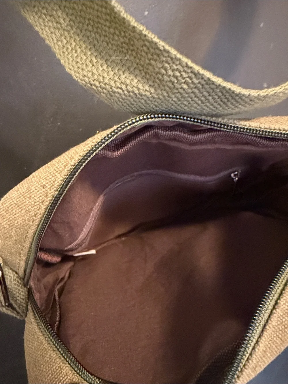 Unisex crossbody Nupouch crossbody bag. Olive colored with tan accent patch.